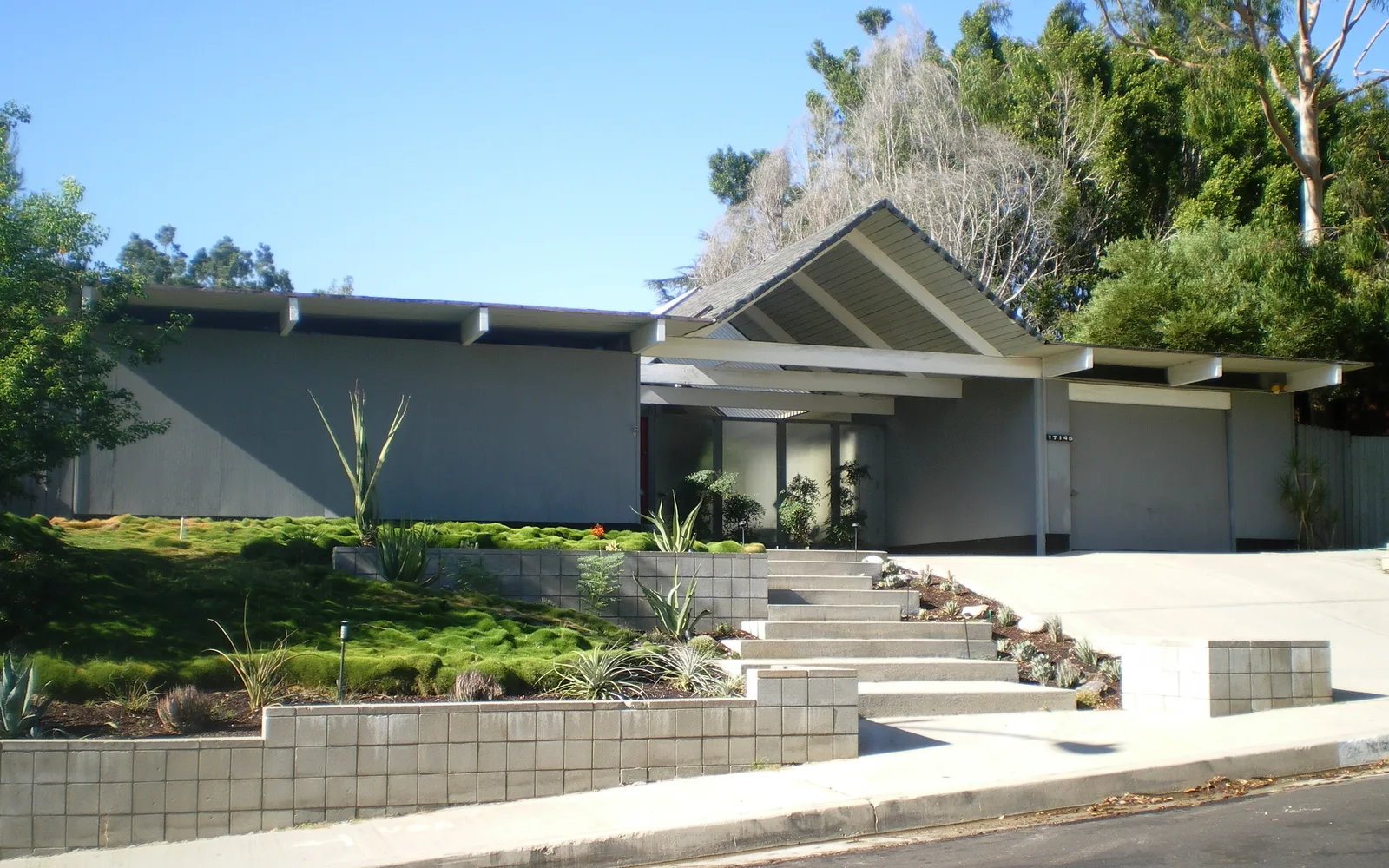 Photograph of an Eichler Homes mid-century modern residence in Granada Hills, showing characteristic single-family architecture typical of post-war California suburban neighborhoods